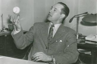 Bob Feller Tossing Baseball in Air photograph, 1956 December 27