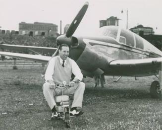 Bob Feller Riding Motor Bicycle photograph, 1951 July 21