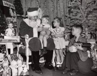 Babe Ruth Dressed as Santa and Children photograph, 1947 December 10