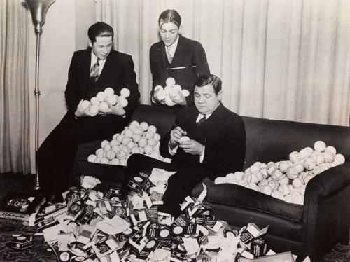 Babe Ruth Autographing Baseballs photograph, 1934