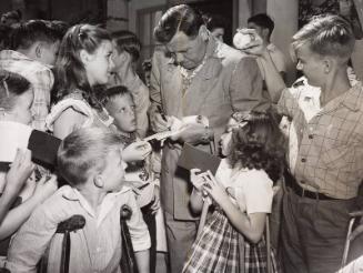 Babe Ruth Signing Autographs photograph, 1948 February 27