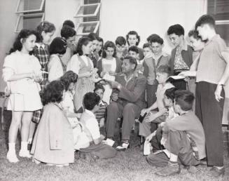 Babe Ruth Signing Autographs photograph, 1948 February 21