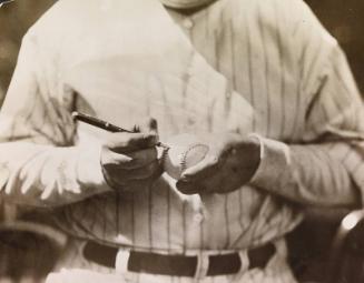 Babe Ruth Signing Baseball photograph, between 1920 and 1934