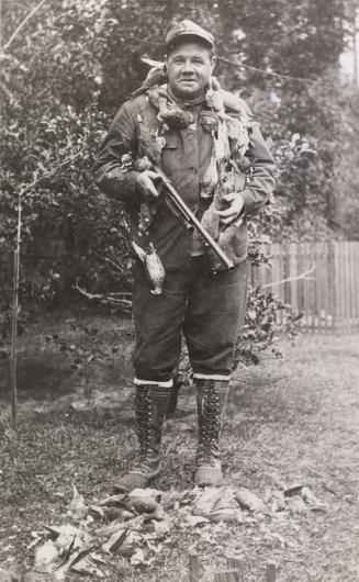 Babe Ruth with Dead Birds Around His Neck photograph, undated