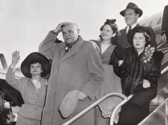 Babe Ruth and Family Boarding Plane photograph, 1947 April 08