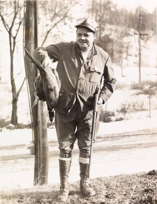 Babe Ruth Holding a Dead Bird photograph, 1935 February 25