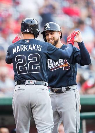 Ender Inciarte and Nick Markakis Celebrating photograph, 2017 June 12