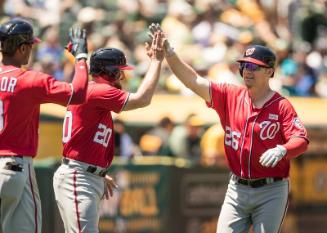 Michael Taylor, Daniel Murphy and Adam Lind Celebrating photograph, 2017 June 03