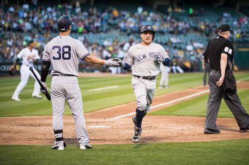 Rob Refsnyder Congratulating Ronald Torreyes photograph, 2017 June 16