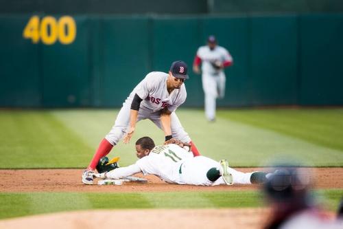 Xander Bogaerts Catching Rajai Davis Stealing photograph, 2017 May 18