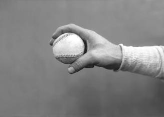 Ed Walsh Holding a Ball digital image, undated