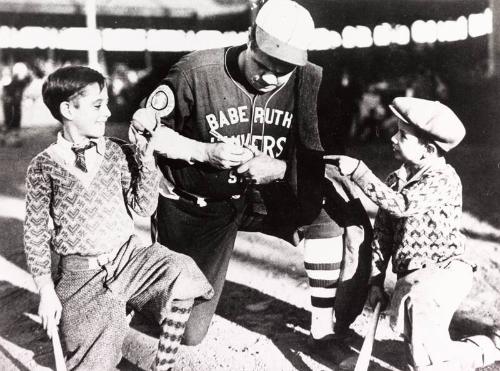 Babe Ruth Signing Baseball photograph, 1927