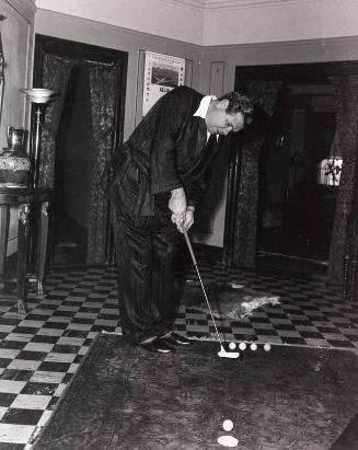 Babe Ruth Putting on 46th Birthday photograph, 1940 February 06