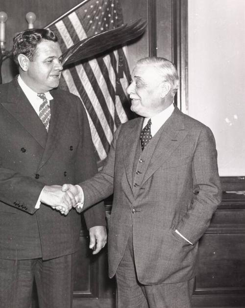 Babe Ruth and Jacob Ruppert Shaking Hands photograph, 1935 February 26