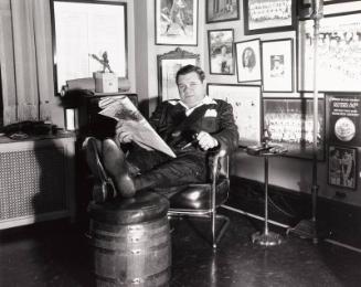 Babe Ruth Reading Newspaper photograph, undated