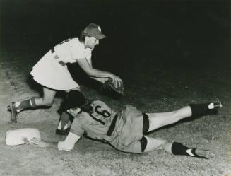 Betty Whiting and Dorothy Kamenshek Action photograph, between 1945 and 1952